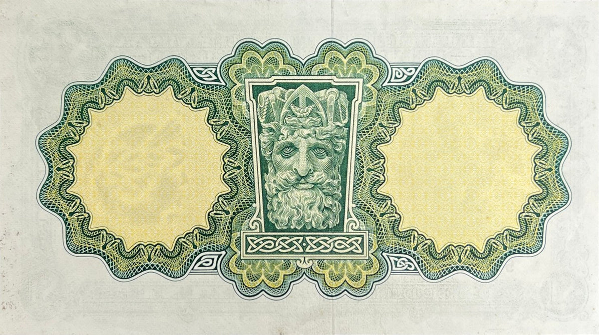 Back view of a 1971 Ireland 1 Pound banknote showing the river-god head from the Custom House in Dublin.