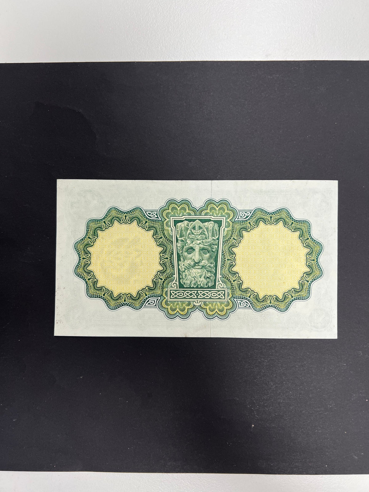 Original unedited photo of the back of an Ireland 1 Pound 1971 P-64c VF banknote