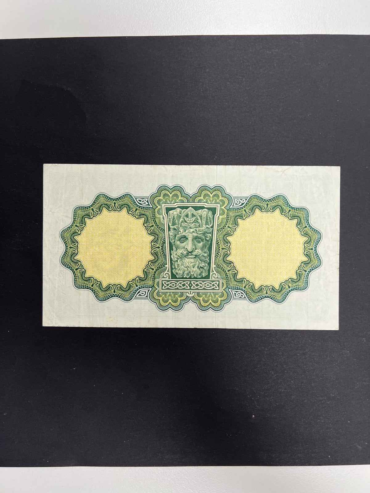 Original unedited photo of the back of an Ireland 1 Pound 1972 P-64c VF banknote
