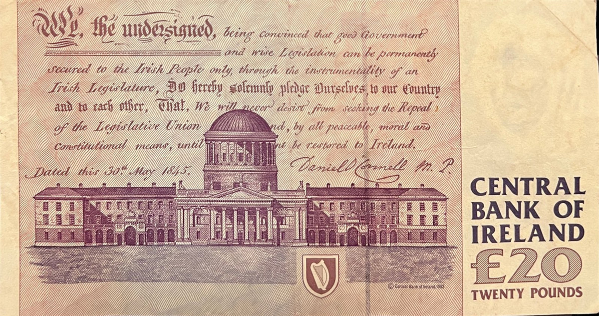 Back view of a 1995 Ireland 20 Pounds banknote showing the Four Courts in Dublin and Daniel O'Connell's 1845 Repeal pledge.