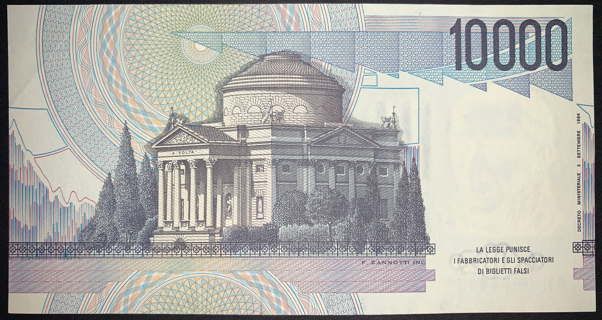 Italy 10,000 Lire 1984 P-112d AUNC banknote reverse depicting the Tempio Voltiano in Como with ornate guilloche patterns and the 10,000 Lire denomination.
