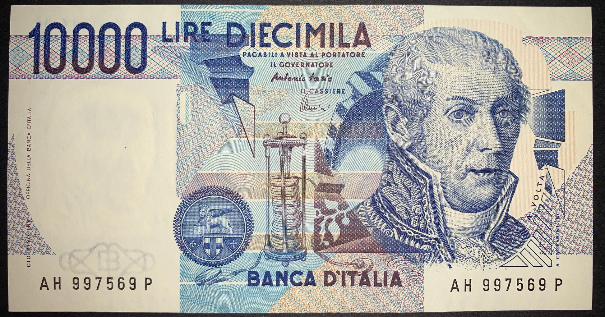 Italy 10,000 Lire 1984 P-112d AUNC banknote obverse featuring Alessandro Volta, an electrostatic generator, the Lion of Saint Mark medallion, and intricate geometric security patterns.