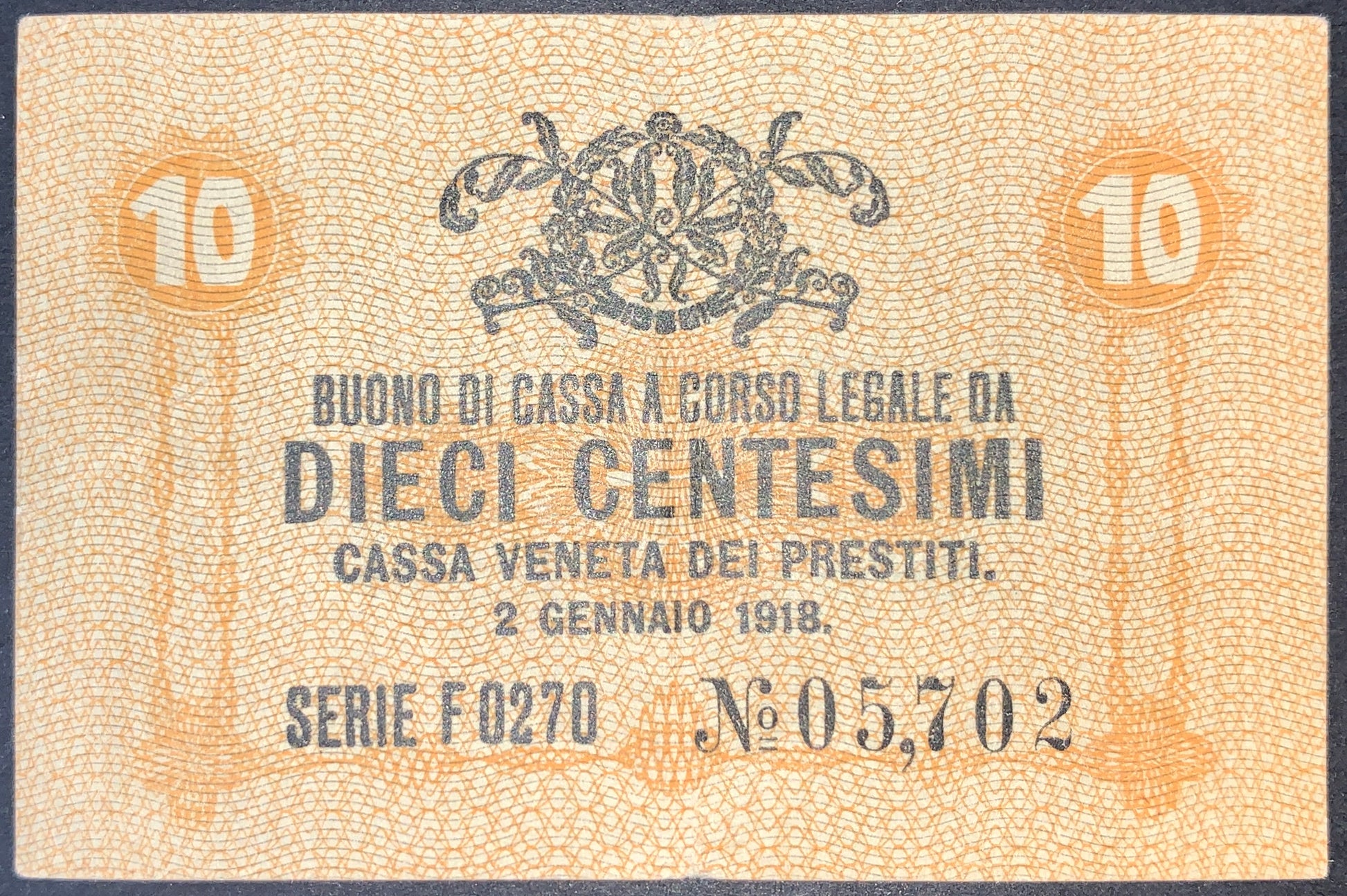 front of Italy 10 Centesimi 1918 P-M2 collectible vintage european small yellow banknote