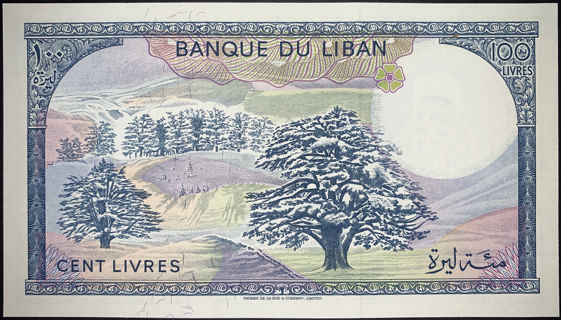 Lebanon 100 Livres banknote reverse depicting ancient archaeological remains and monumental stone architecture in a historic landscape