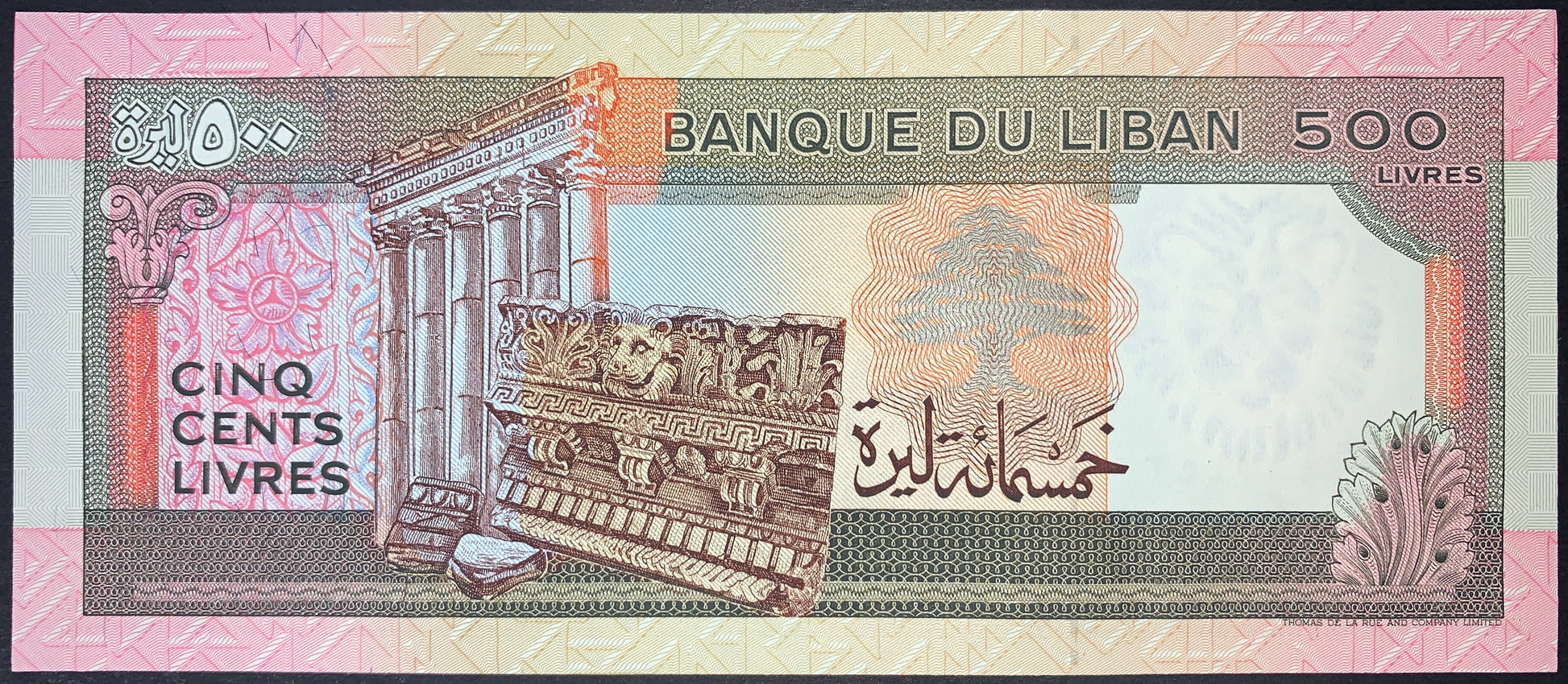 Lebanon 500 Livres banknote reverse displaying a carved ancient capital and classical architectural fragments inspired by Baalbek, accompanied by intricate security patterns and decorative motifs