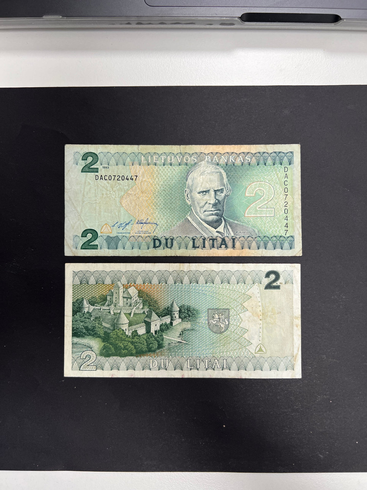 Original unedited photo of a Lithuania 2 Litai 1993 P-54 VF banknote, front and back