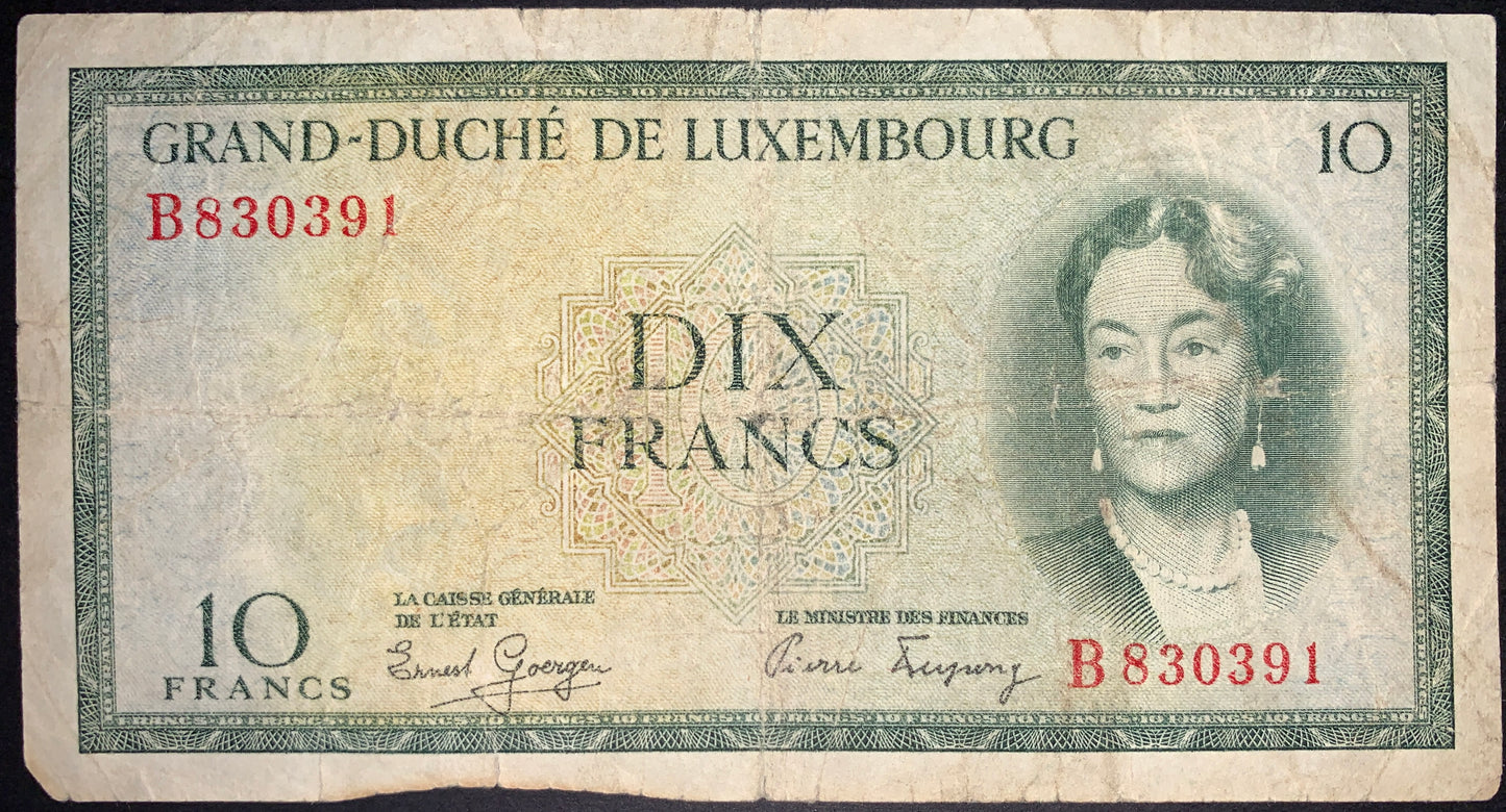 front of Luxembourg 10 Francs ND (1954) P-48 VG collectible vintage banknote with portrait of Grand Duchess Charlotte