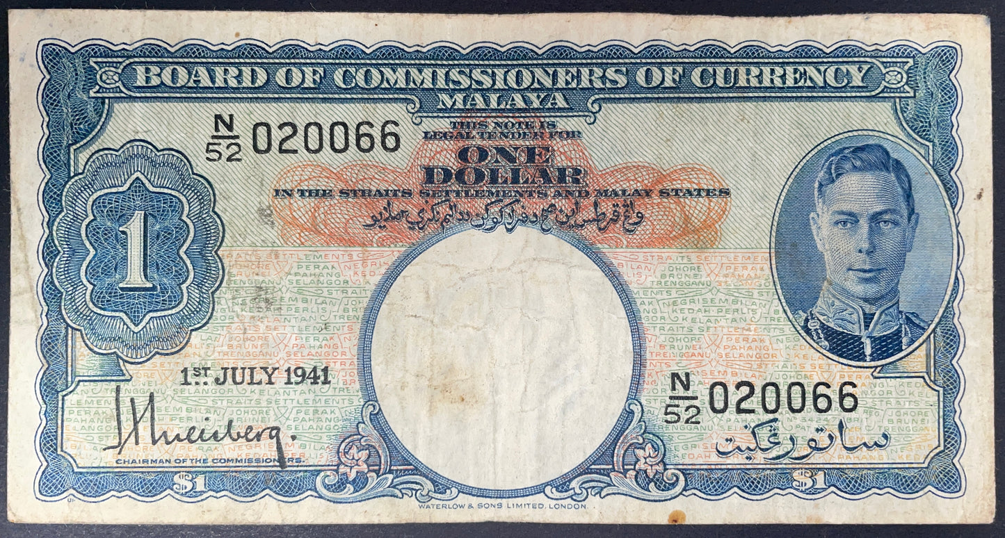 Front of 1941 Malaya 1 Dollar banknote featuring King George VI portrait, serial number N/52 020066, and July 1 1941 date