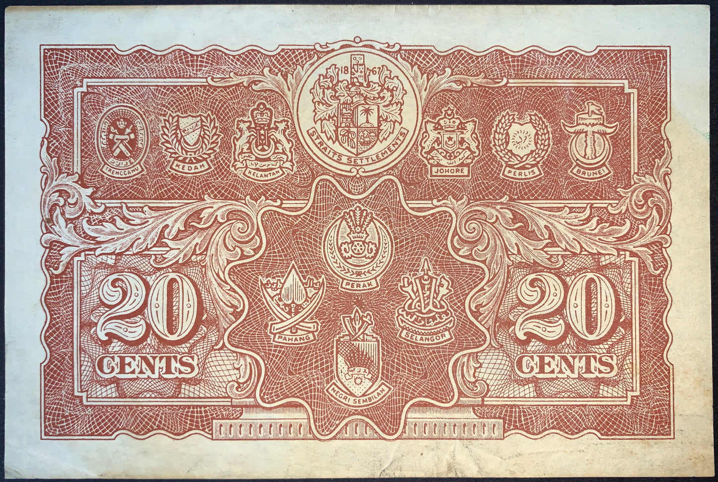 Reverse of authentic Malaya 20 Cents 1941 banknote Pick P-9 featuring the heraldic emblems of the Straits Settlements and Malay States, Very Fine (VF) condition.