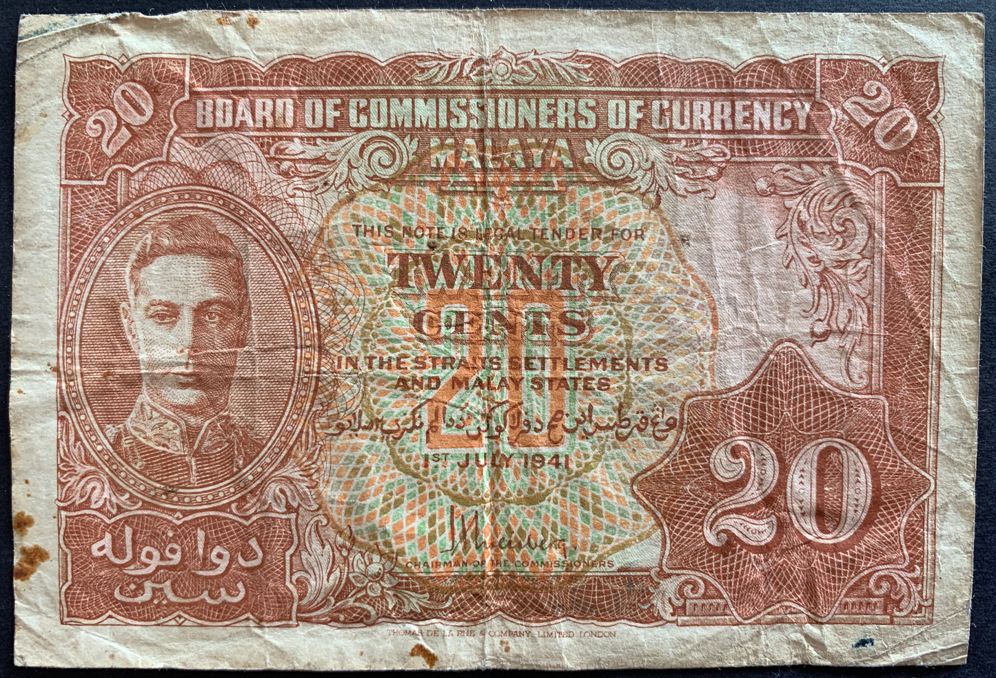 front of Malaya 20 Cents 1941 P-9 VF collectible vintage banknote with portrait of King George VI