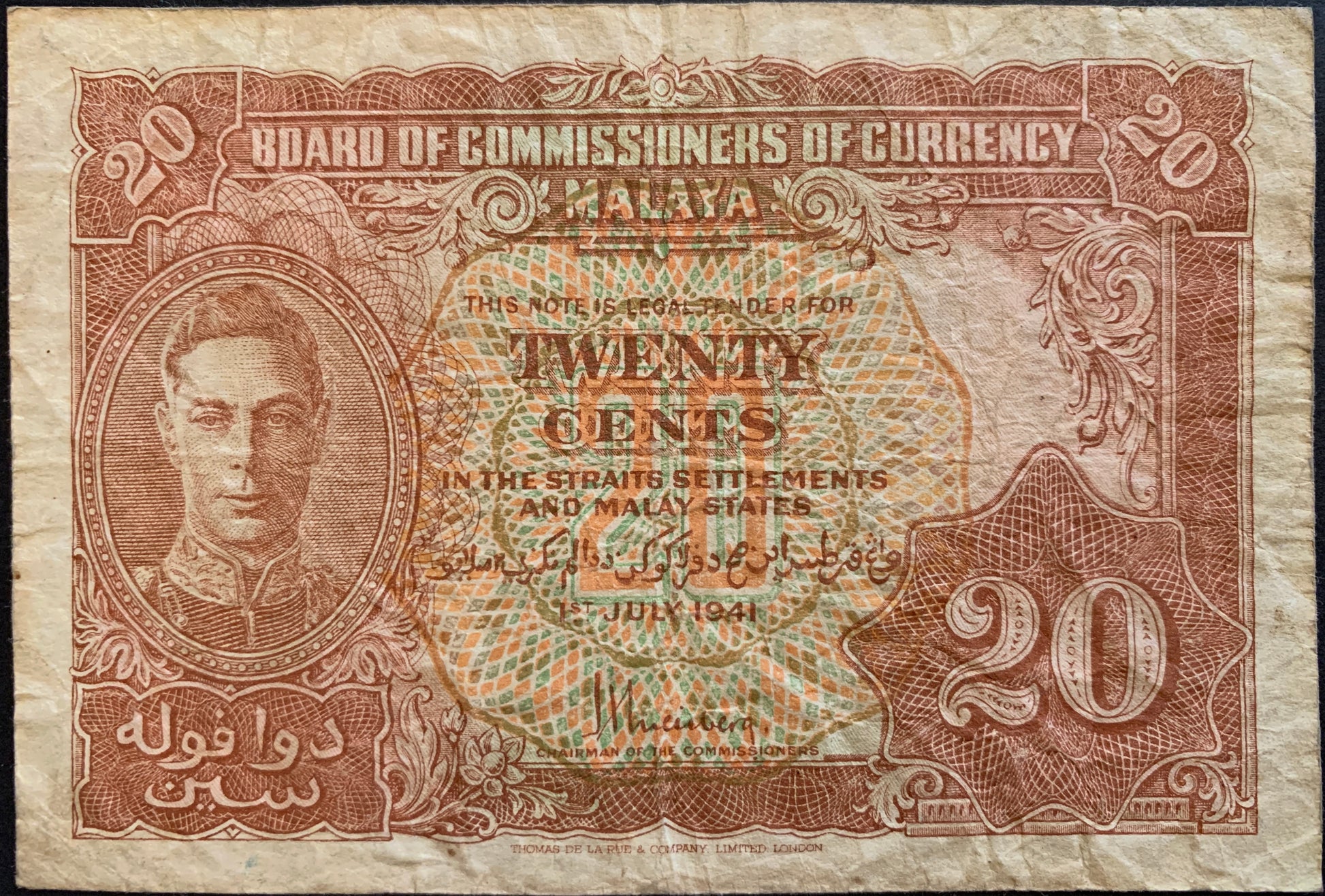 front of Malaya 20 Cents 1941 P-9 VF collectible banknote with portrait of King George VI