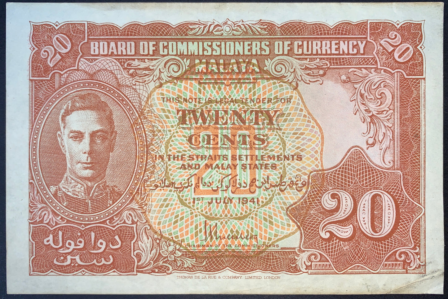 Obverse of authentic Malaya 20 Cents banknote dated 1 July 1941, Pick P-9, featuring King George VI portrait with ornate guilloche design, Very Fine (VF) condition.