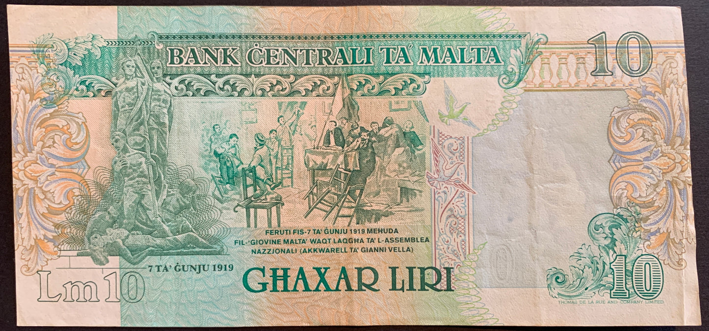 Malta 10 Liri ND (1989) P-43 vintage collectible pre-euro banknote with 7th June 1919 Monument and Wounded people brought into the National Assembly on 7th June 1919 painting by Gianni Vella