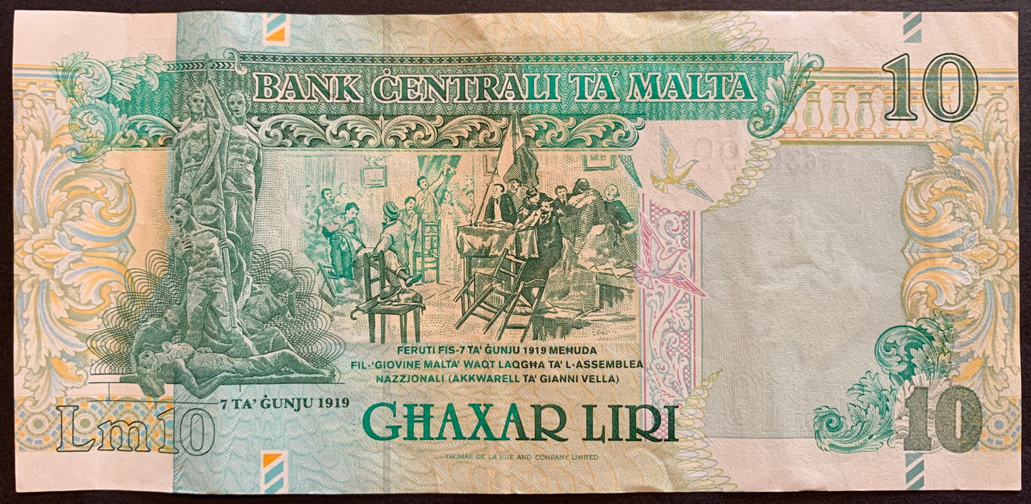 Malta 10 Liri ND (1997-1999) P-47b VF collectible pre-euro banknote with "7th June 1919" Monument at left, Wounded people brought into the National Assembly on 7th June 1919 (painting by Gianni Vella)