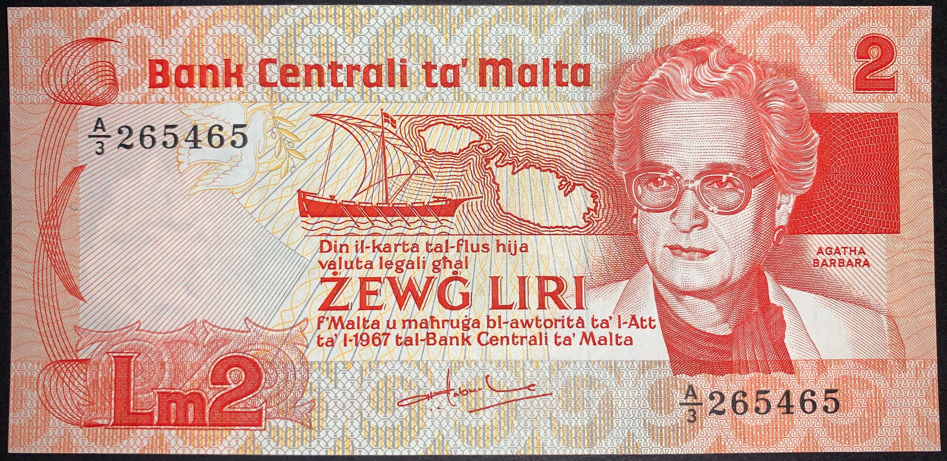 Malta 2 Liri banknote ND (1986) P-37 obverse featuring Agatha Barbara at right, a traditional Maltese boat sailing before a map of Malta, dove motif, and intricate security patterns. Red, orange, and gray design issued by the Central Bank of Malta.
