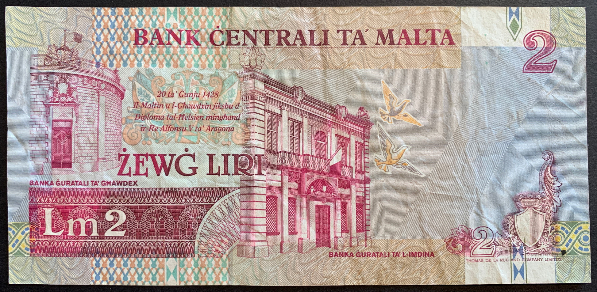 Malta 2 Liri ND (1994) P-45a vintage collectible pre-european banknote with doves, Bank buildings in Għawdex (Gozo) and Mdina and Decree of King Alfonso V of Aragon