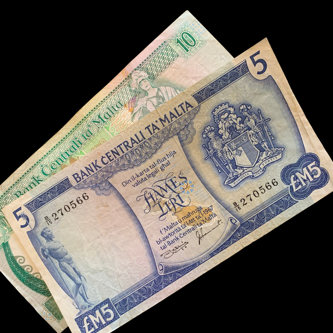Two Collectible Vintage Pre-Euro Maltese banknotes with intricate designs and text on a black background
