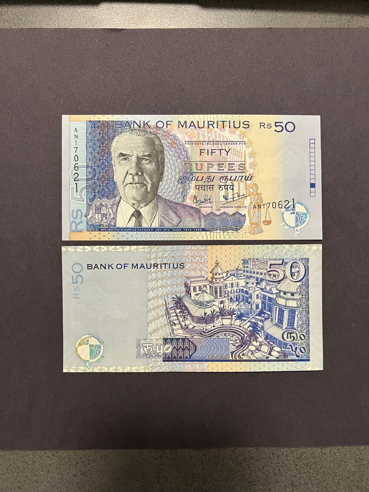 Original unedited photo of a Mauritius 50 Rupees 2001 P-50b UNC banknote, front and back