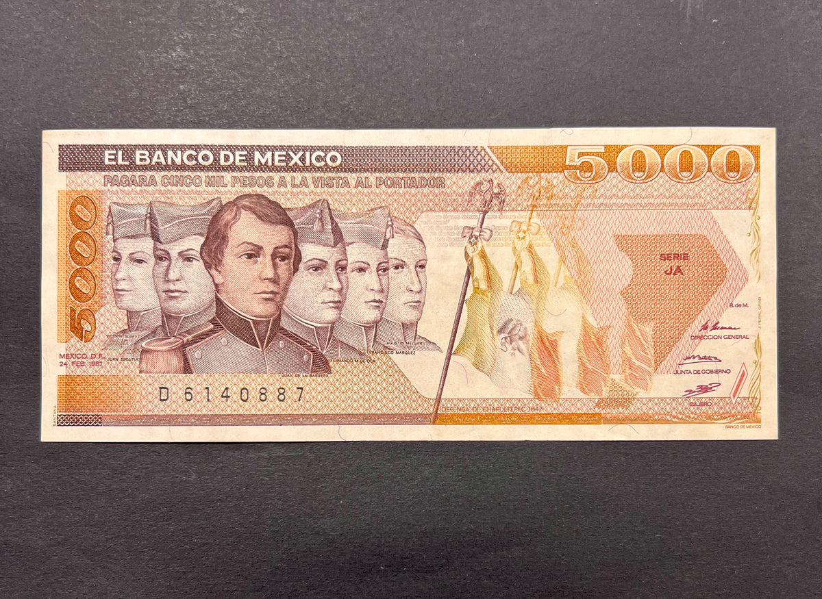 Front view of a crisp, uncirculated 1987 Mexico 5000 Pesos banknote featuring the portraits of the six Niños Héroes (Boy Heroes) and the Mexican flag.