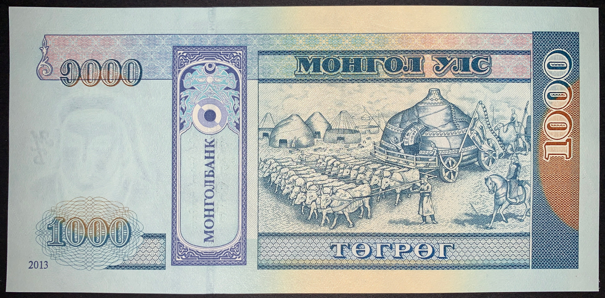 back of Mongolia 1000 Tögrög 2013 P-67d UNC collectible modern banknote with cattle
