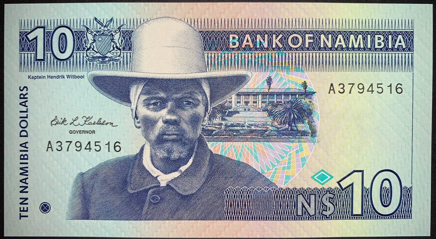 front of Namibia 10 Dollars ND (1993) P-1 UNC collectible vintage banknote with portrait of Hendrik Witbooi, Parliament building in Windhoek, Namibian Coat of Arms