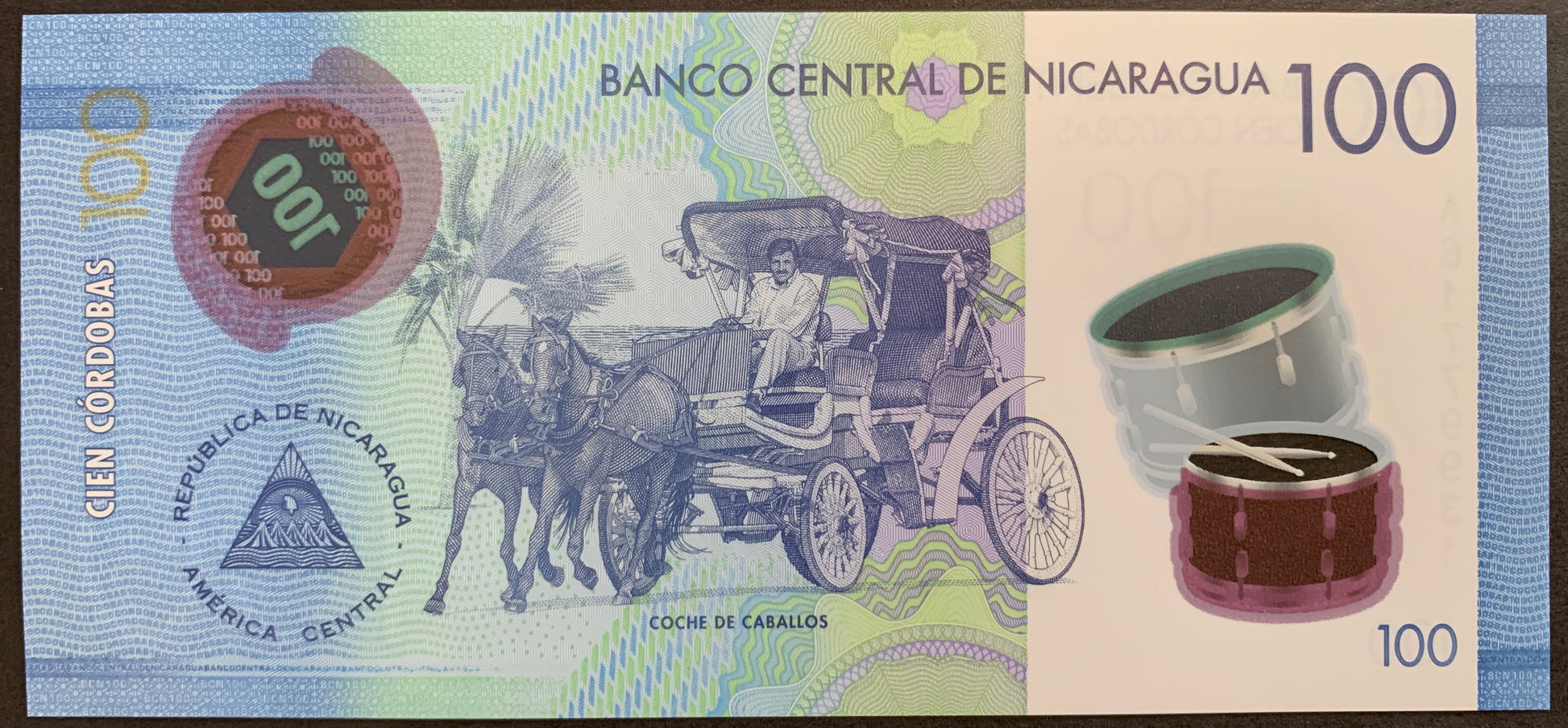 Nicaragua 100 Córdobas 2014 P-212a uncirculated polymer banknote with Horse-drawn carriage