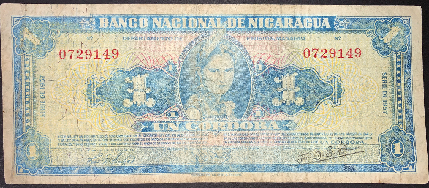 Nicaragua 1 Córdoba 1957 P-99b banknote front showing indigenous woman portrait, Banco Nacional de Nicaragua title, red serial numbers, and ornate blue engraved design