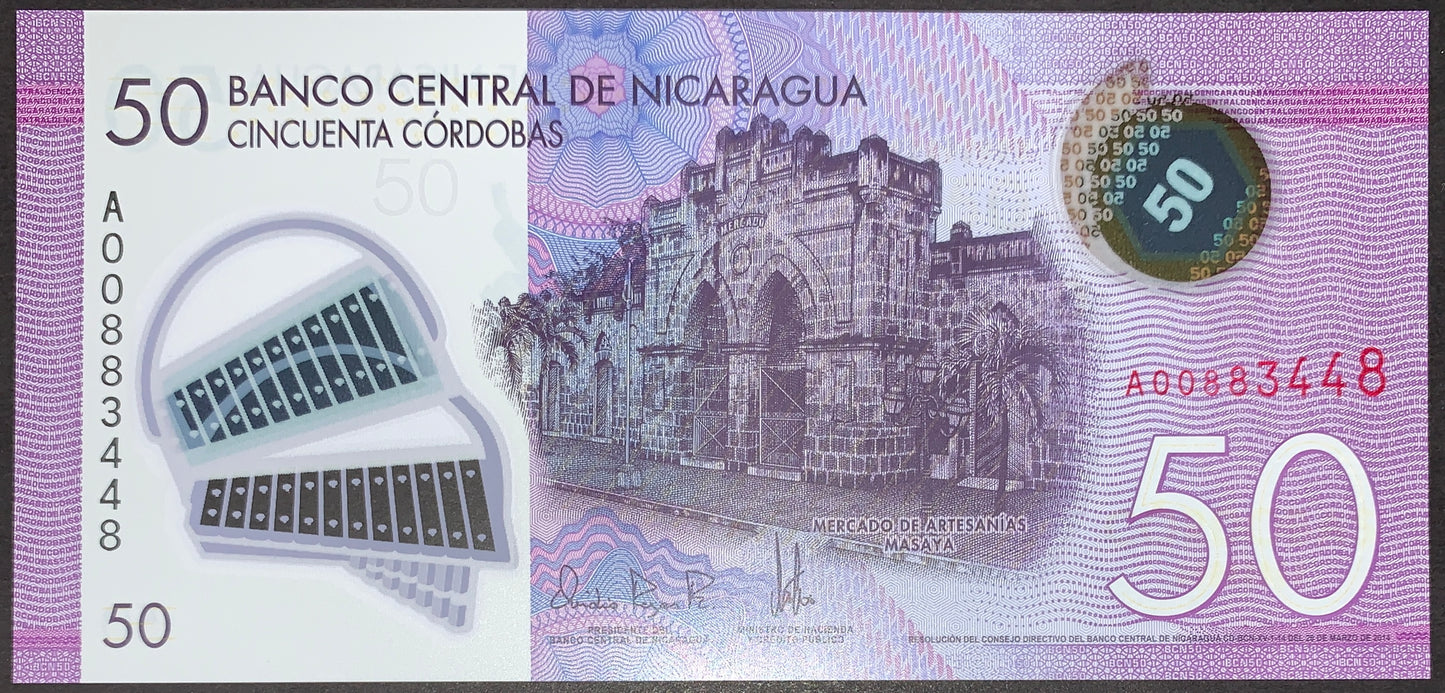 Nicaragua 50 Córdobas 2014 P-211a UNC polymer banknote front showing Mercado de Artesanías Masaya, transparent security window, holographic feature and purple banknote design