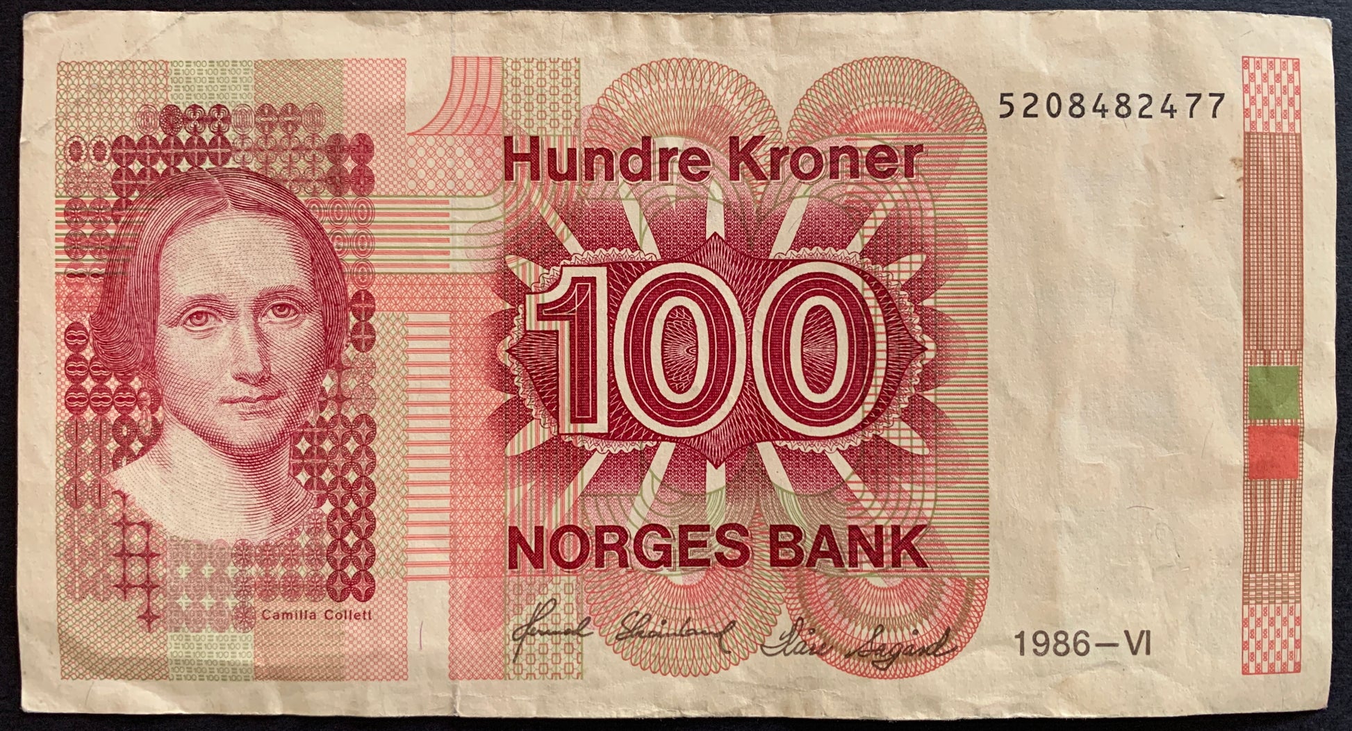 Front of the 1986 Norway 100 Kroner banknote (P-43c) featuring the portrait of Camilla Collett with detailed engraving and security features, shown in VF condition.