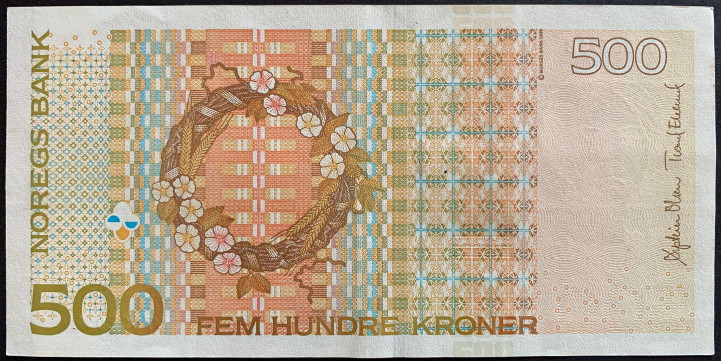 Back of the 2012 Norway 500 Kroner banknote (P-51f) displaying medieval architectural motifs and decorative patterns inspired by Norwegian history, shown in VF+ condition