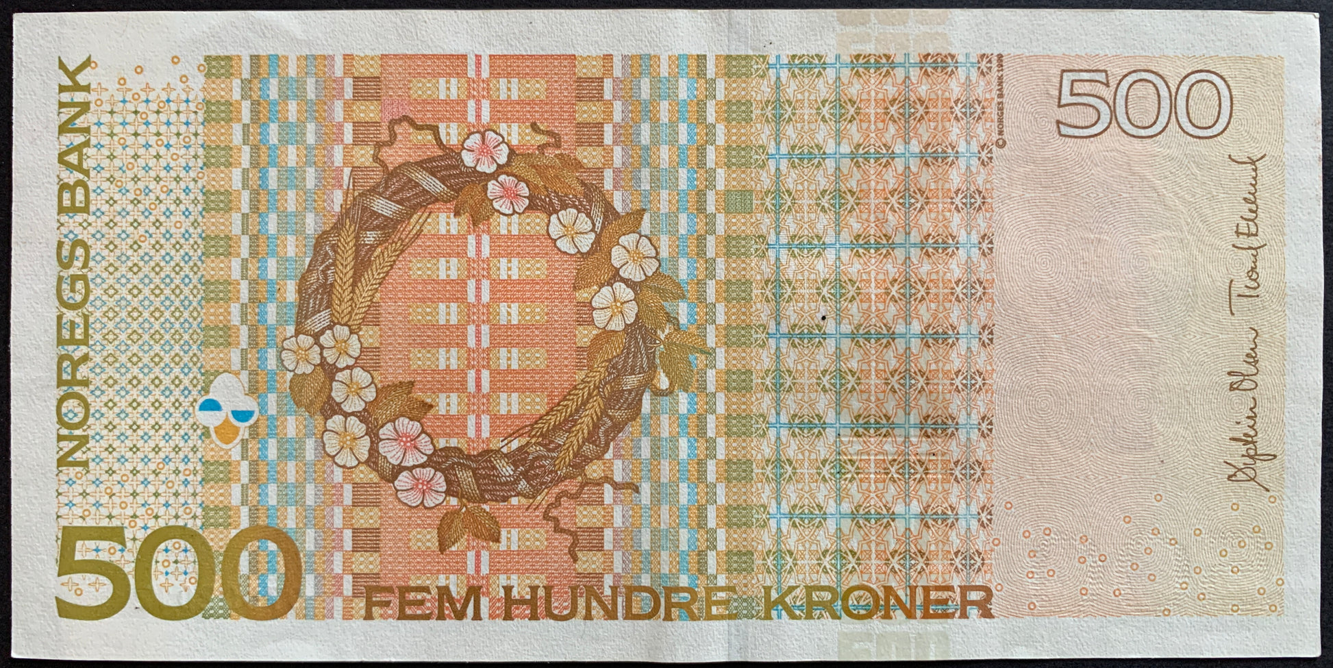 Back of the 2012 Norway 500 Kroner banknote (P-51f) displaying medieval architectural motifs and decorative patterns inspired by Norwegian history, shown in VF+ condition