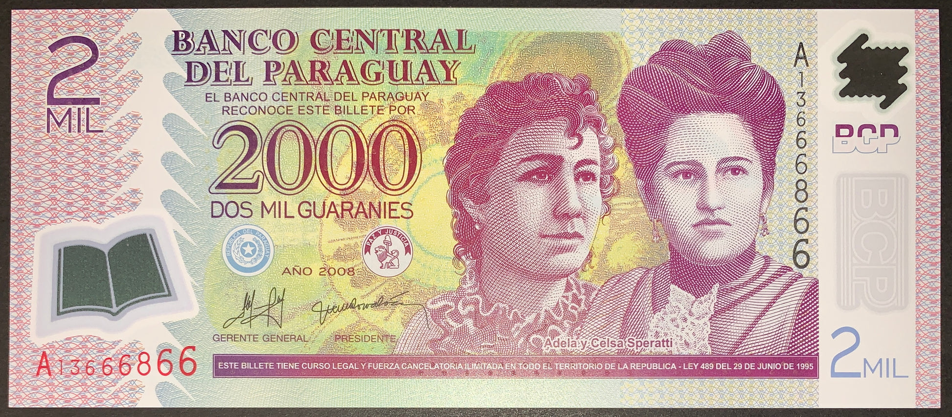 front of Paraguay 2000 Guaranies 2008 P-228a UNC Polymer colectible modern banknote with portraits of two women