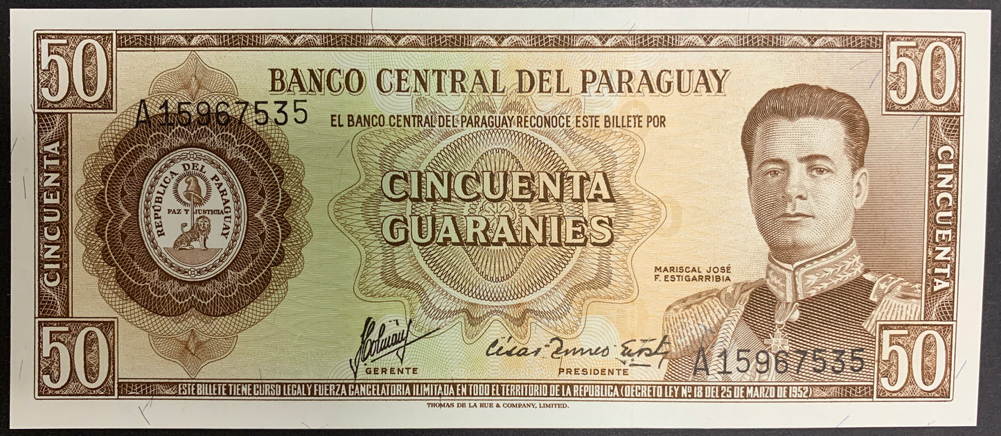 Obverse of a Paraguay 50 Guaraníes banknote (P-197b) issued by Banco Central del Paraguay. The design showcases Marshal José Félix Estigarribia in military dress on the right, the Paraguayan national seal on the left, and the denomination “Cincuenta Guaraníes” prominently displayed in the center. Intricate brown and green engraving patterns, signatures, serial numbers, and decorative security elements are clearly visible. Actual serial numbers may vary as multiple banknotes are available.