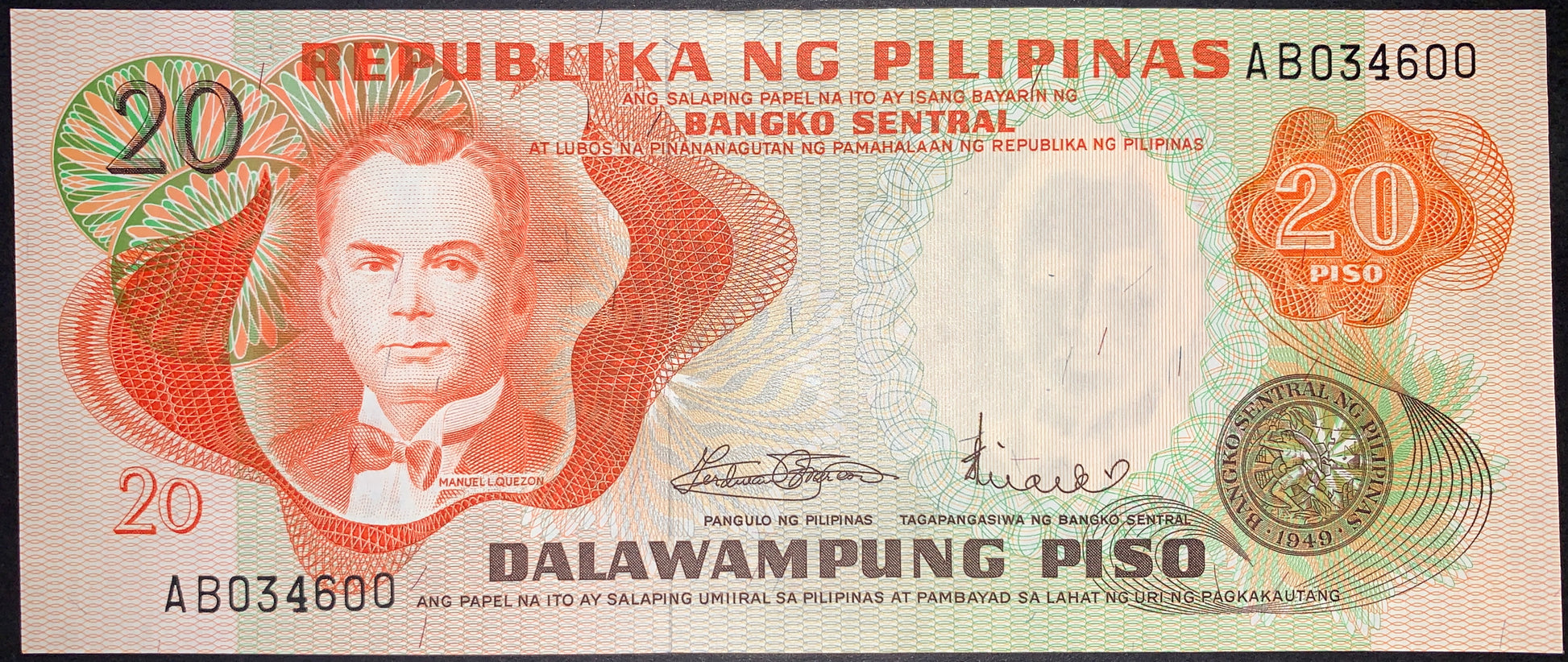 Front of Philippines 20 Piso banknote featuring Manuel L. Quezon portrait, Banco Sentral seal, serial number AB034600, and vibrant red-orange security patterns.