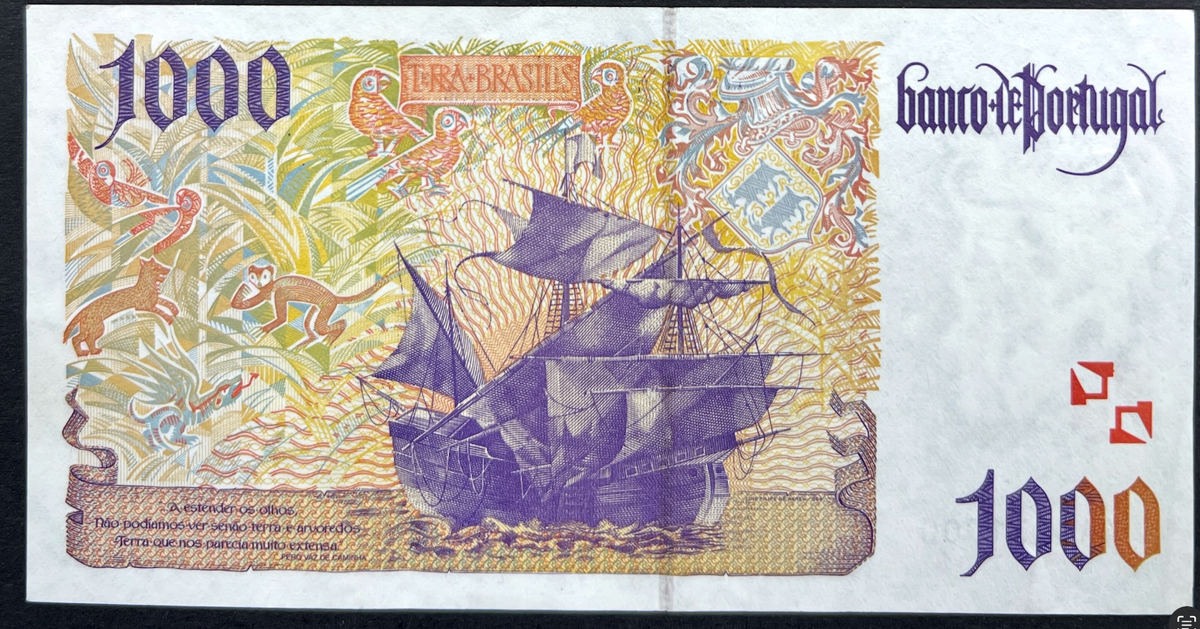 Back view of a vintage 1996 Portugal 1000 Escudos banknote showcasing a detailed engraving of a sailing ship arriving in Brazil, surrounded by exotic animals and the text Terra Brasilis.
