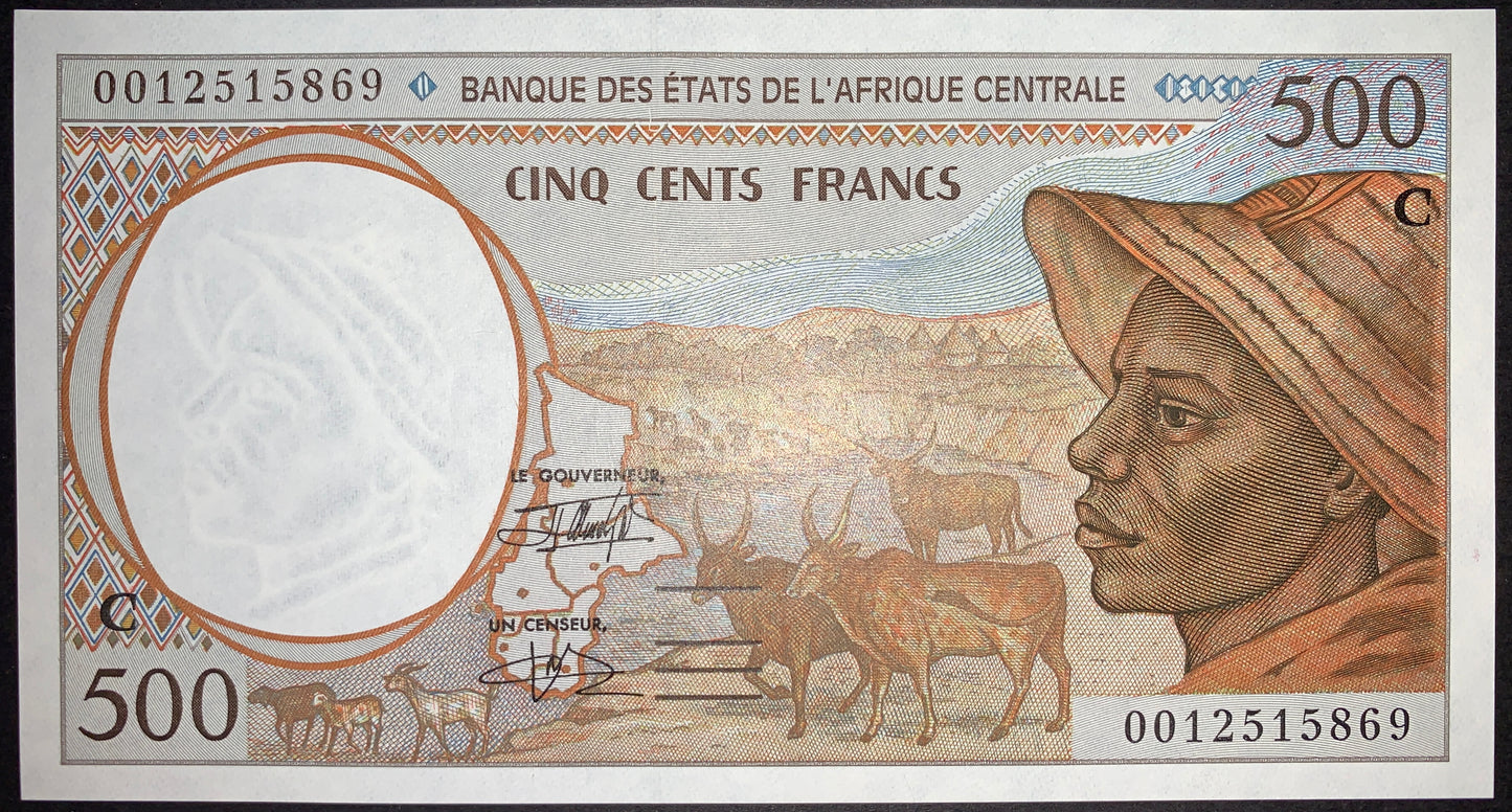 Obverse of the Republic of the Congo 500 Francs 2000 P-101Cg UNC banknote featuring a Central African shepherd, Zebu cattle, a map of the Central African States, and a watermark showing three antelope heads. Authentic BEAC CFA Franc banknote.
