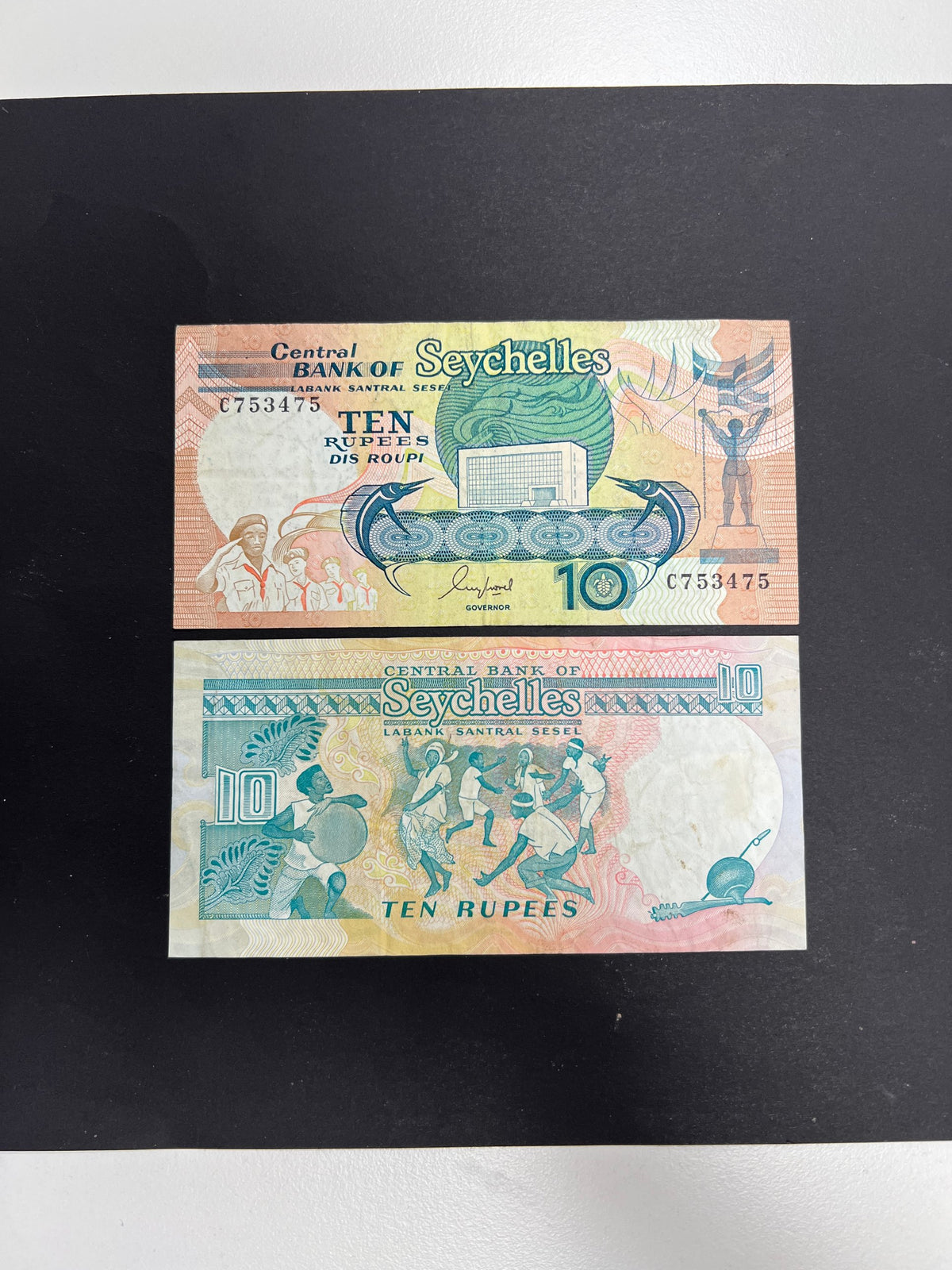 Original unedited photo of a Seychelles 10 Rupees ND (1989) P-32 VF banknote, front and back