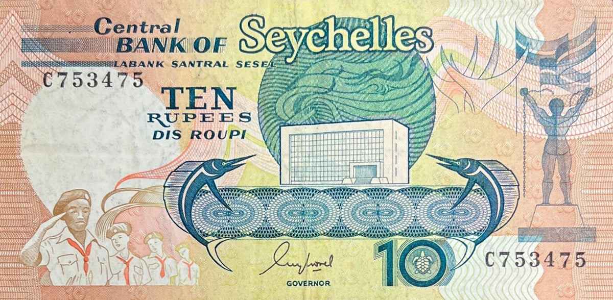 Front view of a very fine 1989 Seychelles 10 Rupees banknote featuring the Zonm Lib liberation statue, saluting scouts and the Central Bank building.