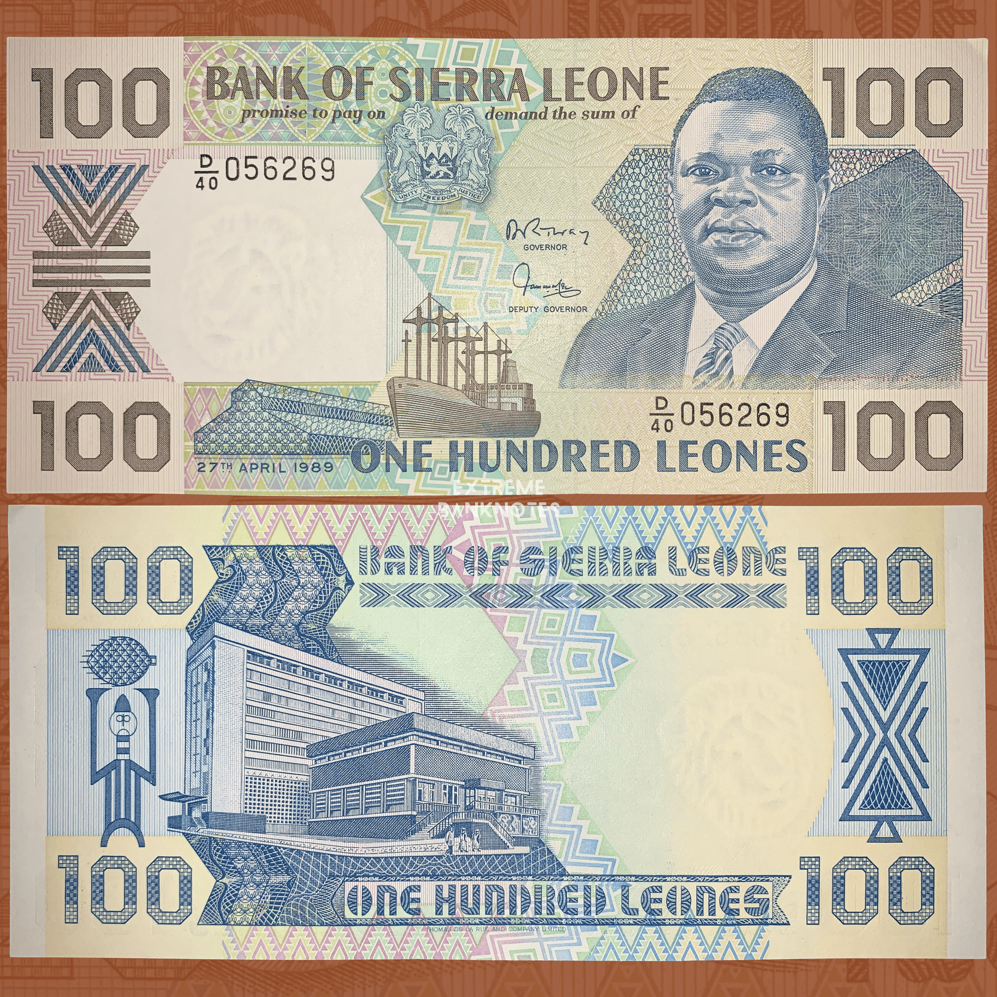 Authentic Sierra Leone 100 Leones banknote P-18b featuring the portrait of President Joseph Saidu Momoh on the obverse and the Bank of Sierra Leone headquarters on the reverse, a colorful collectible African banknote.