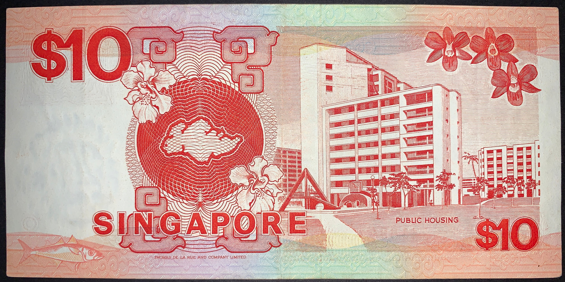back of Singapore 10 Dollars ND (1988) P-20 VF collectible vintage banknote with map of singapore, flowers, and building