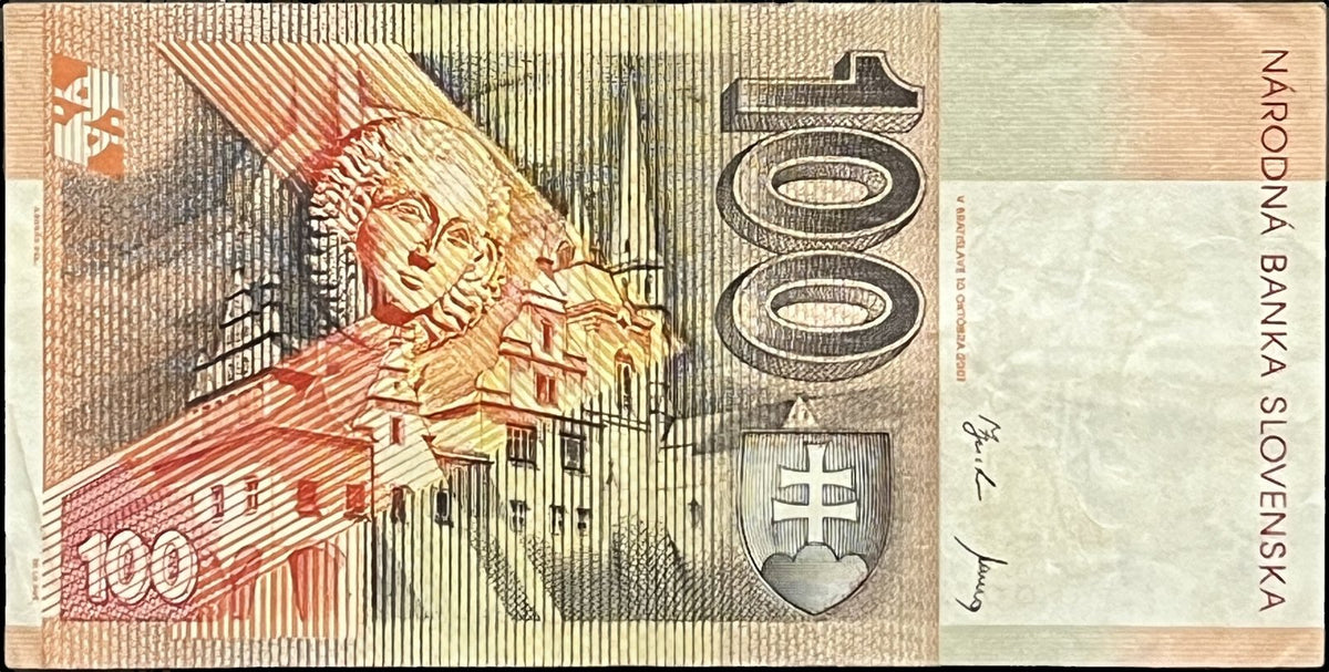 Back view of a 2001 Slovakia 100 Korún banknote showing St. James’s Basilica and the town hall of Levoča with the Slovak double-cross coat of arms.