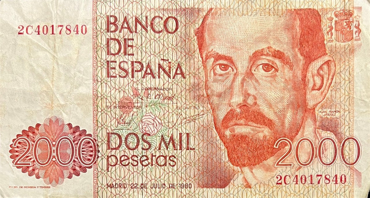 Front view of a circulated 1980 Spain 2000 Pesetas banknote featuring Nobel poet Juan Ramón Jiménez with roses.