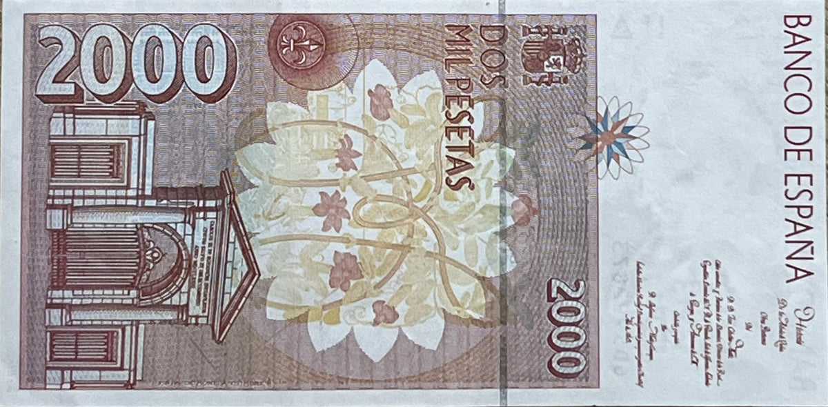 Back view of a 1992 Spain 2000 Pesetas banknote showing the Royal Gate of the Madrid Royal Botanical Garden and a large stylised flower.