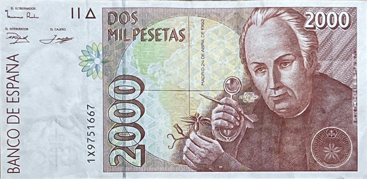 Front view of a circulated 1992 Spain 2000 Pesetas banknote featuring botanist José Celestino Mutis examining a flower with a magnifying glass over a map of the Americas.
