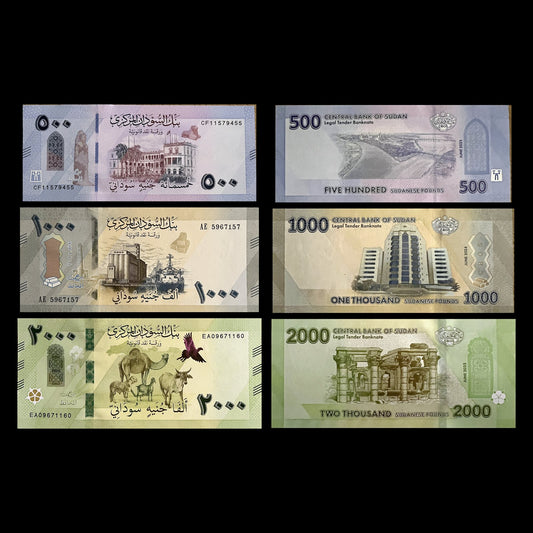Sudan 500, 1000 & 2000 Pounds 2024–2025 UNC set – fronts with the Republican Palace, grain silos and camel with livestock, backs with the Nile confluence, Central Bank tower and Naqa Roman Kiosk