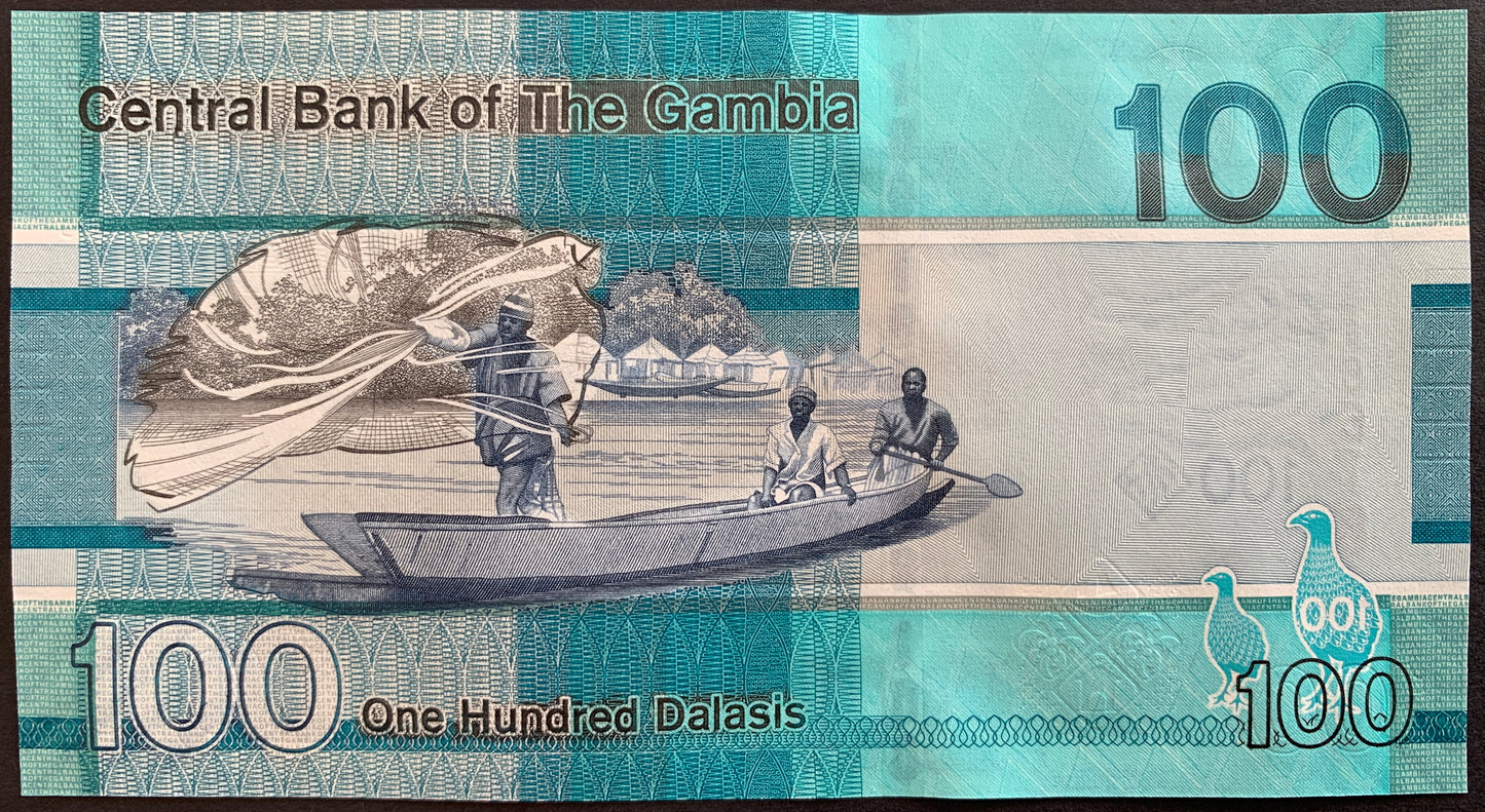 back of The Gambia 100 Dalasis 2023 collectible banknote with fishermen in boat