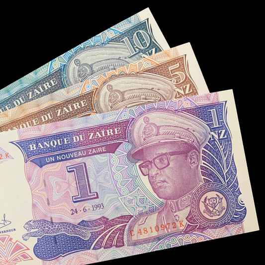 bundle of 1, 5, and 10 zaires banknotes on black background