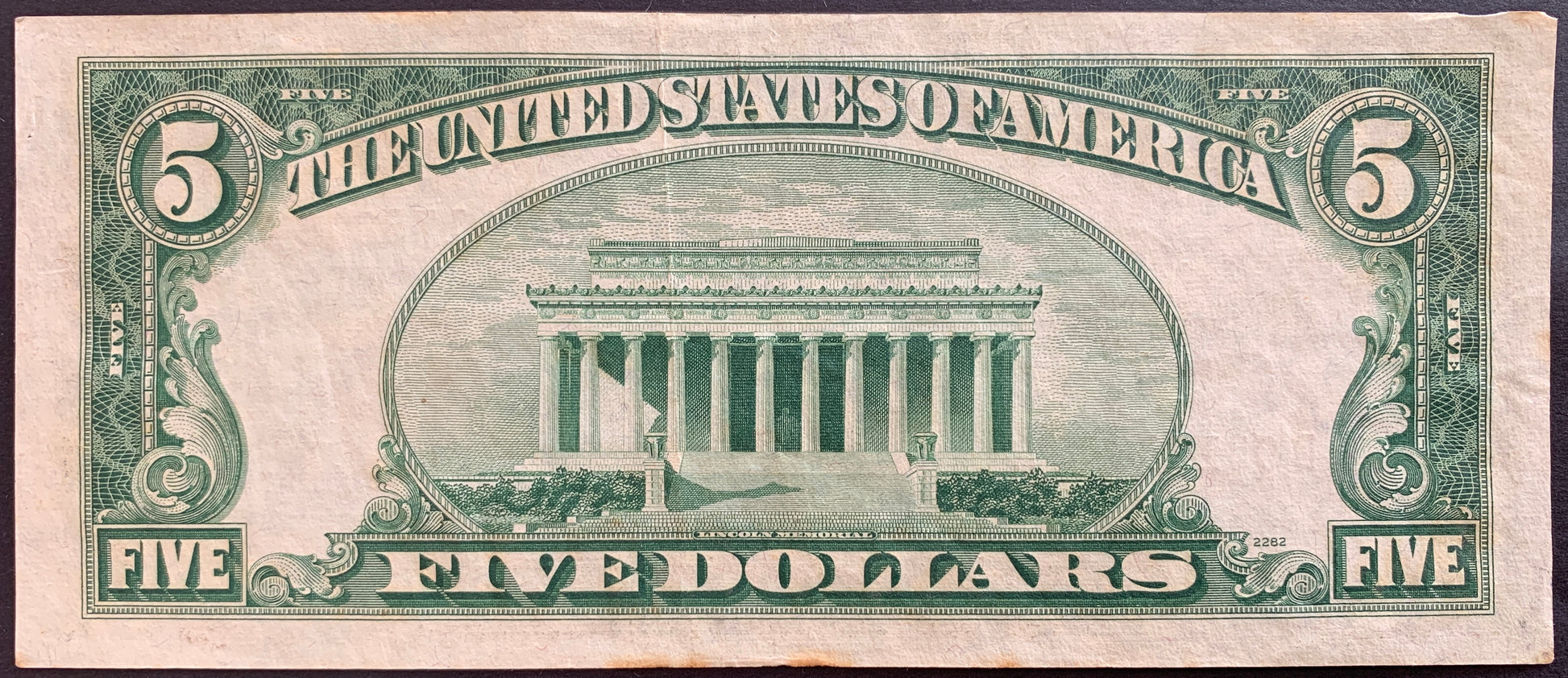back of USA 5 Dollars 1953 P-381 VF collectible banknote with Lincoln memorial