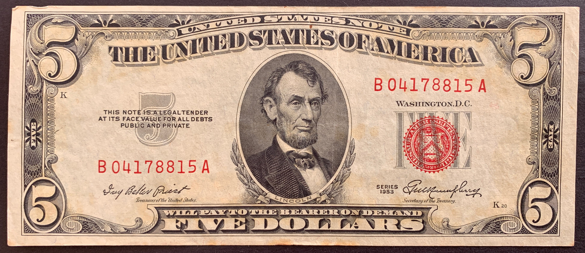 front of USA 5 Dollars 1953 P-381 VF collectible banknote with portrait of Abraham Lincoln and red treasury seal