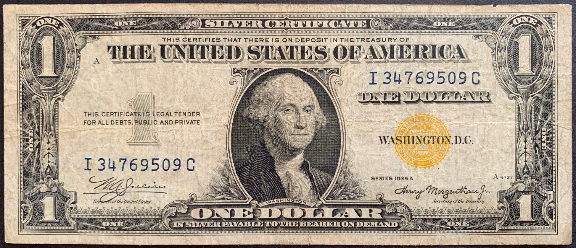 front of USA Silver Certificate 1 Dollar 1935 A P-416AY F+ Yellow Seal vintage collectible banknote with portraite of George Washington